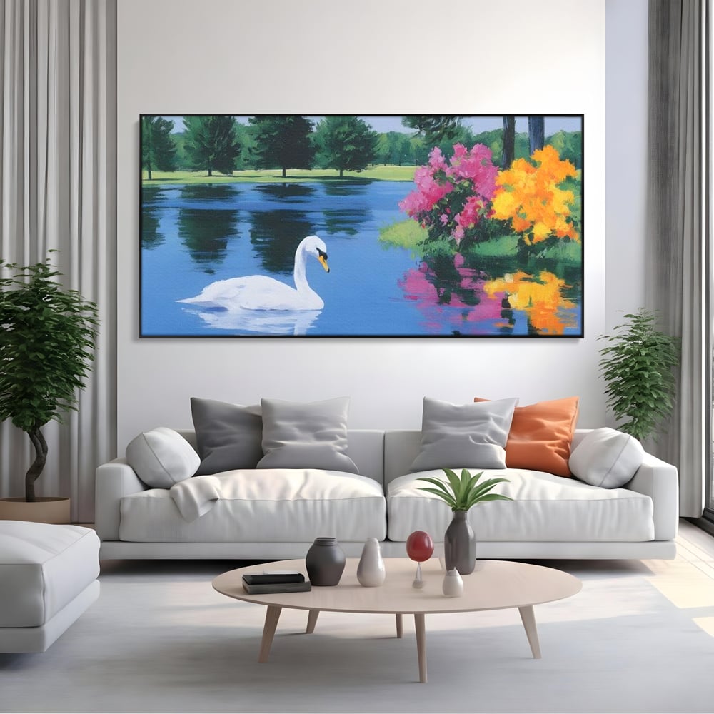 Tablou canvas cu pictura cu lebada pe lac si flori, in rama de aluminiu negru, pe perete intr-un living